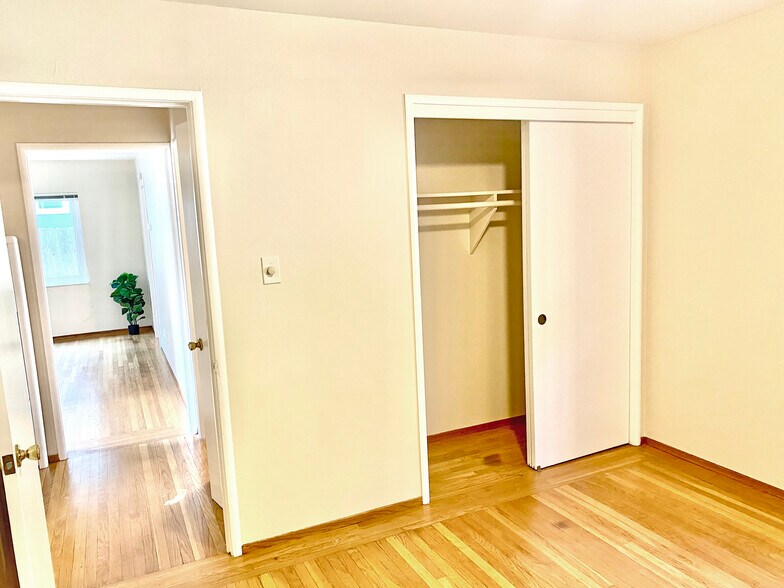 bedroom 1 looking down hall - 1114 Stannage Ave