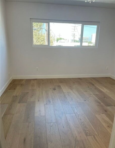 Building Photo - 6255 Woodman Ave