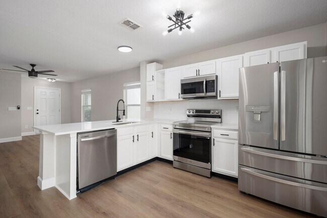 Building Photo - Fully Renovated Samara Lakes Home with Stunning Water Views!