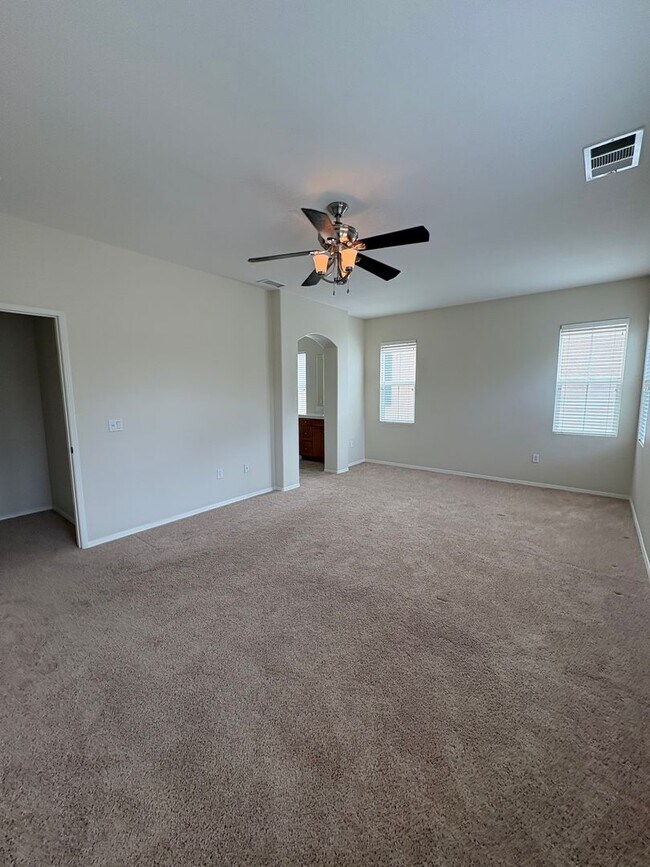 Building Photo - Stunning Home in a Desirable Gated Community