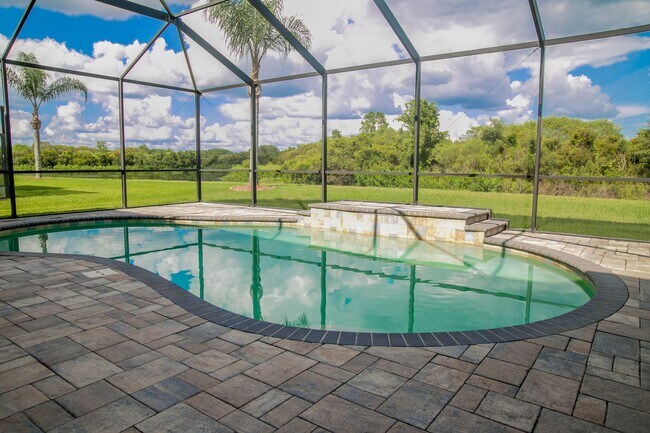 Building Photo - Elegant 5-Bedroom Pool Home with 3-Car Gar...