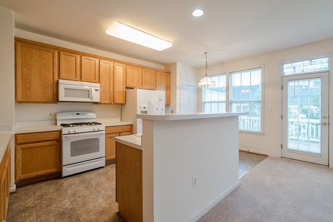 Building Photo - Sun-Filled And Spacious 3 Bedroom 2.5 Bath...