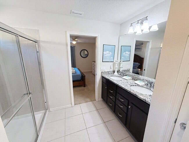 Building Photo - Welcome home to the fully furnished 5-bedroom, 5.5-bathroom private pool home located in Windsor ...