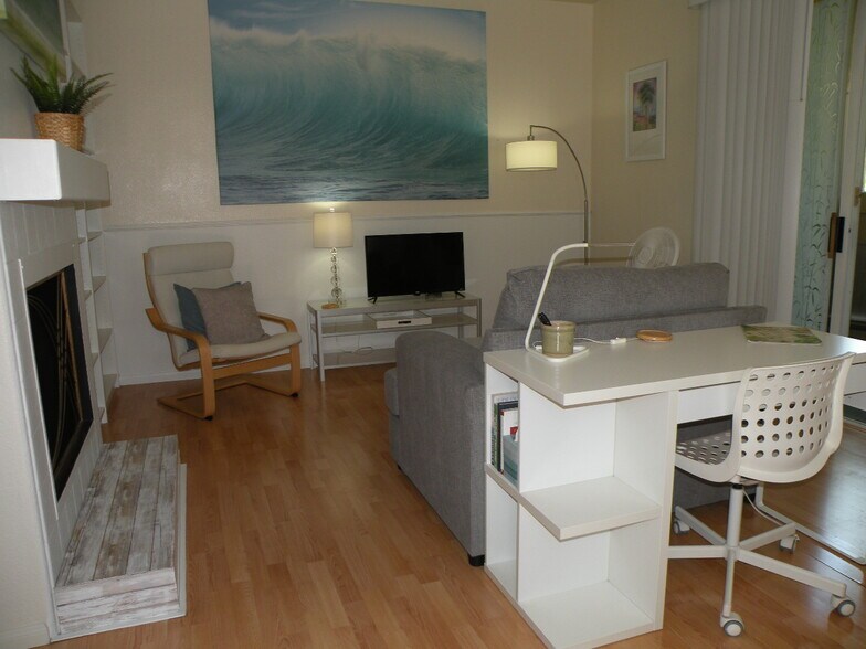 Work desk looking onto living room - 8680 New Salem St