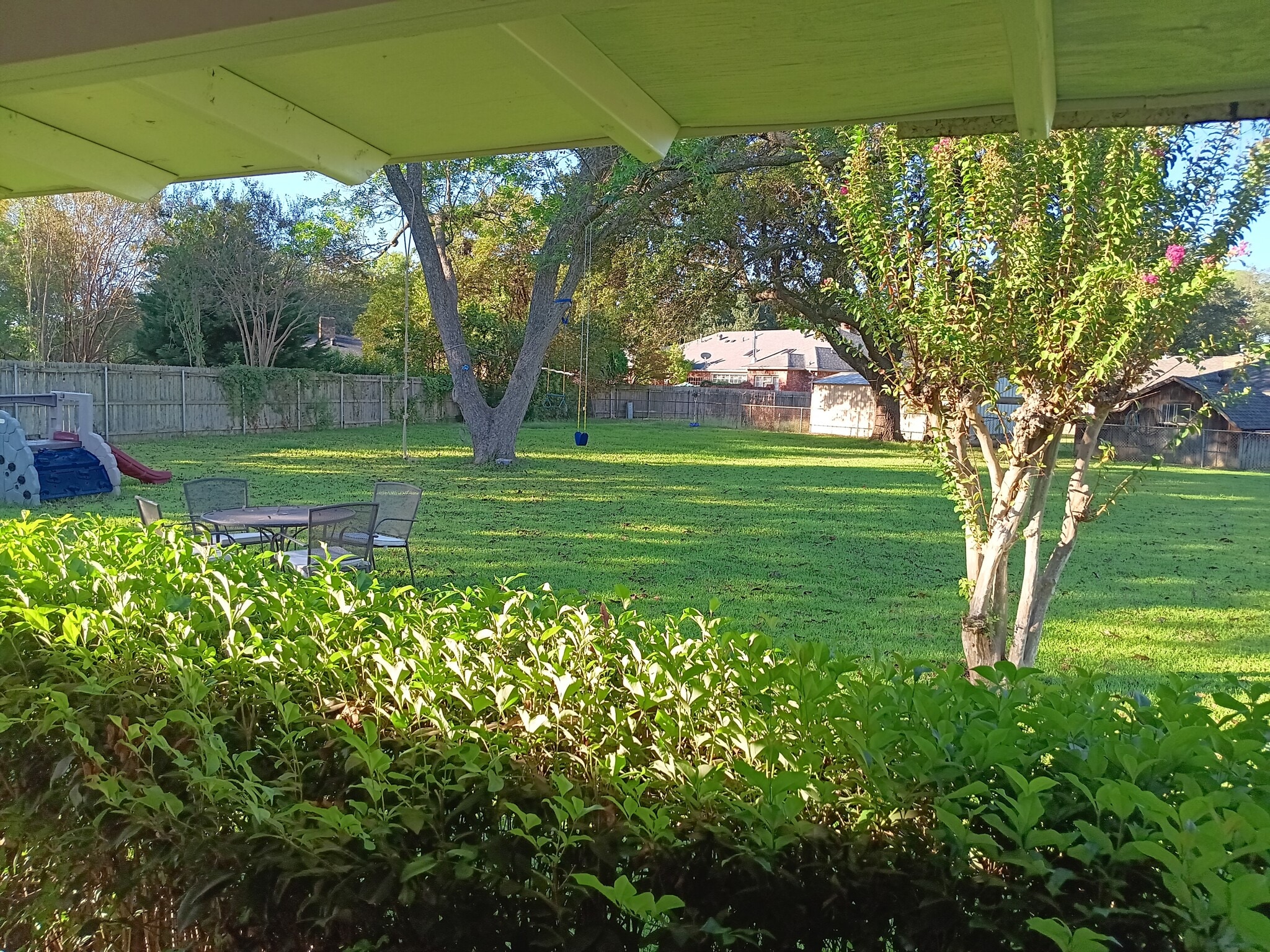 looking out into the yard from under the porch - 2308 Wesley Cir