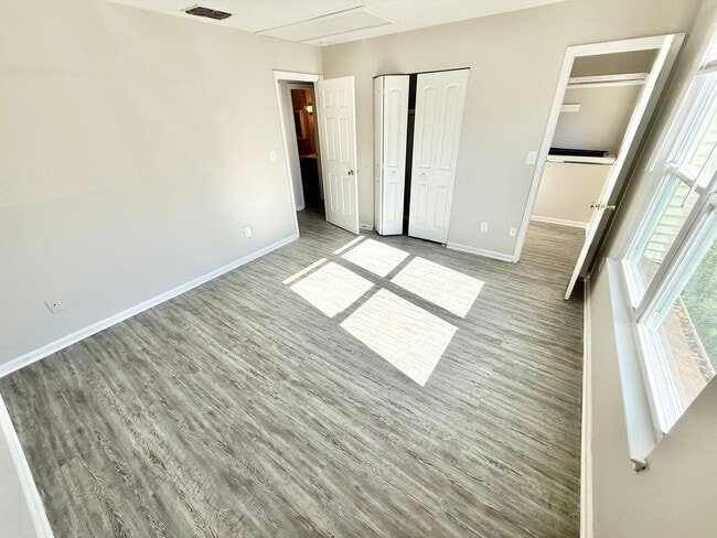 Building Photo - *** RENT READY!! Newly remodeled townhome! ALL Laminate.