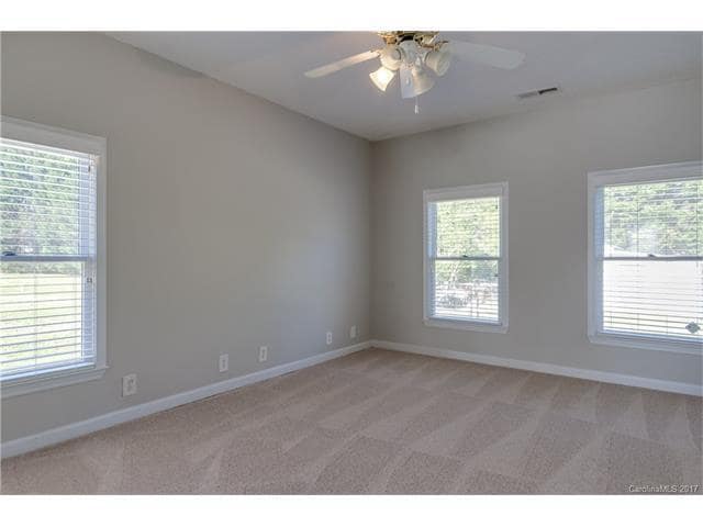 Building Photo - "Charming 4-Bedroom Retreat in Gastonia with Granite Touches & Gleaming Hardwoods!"