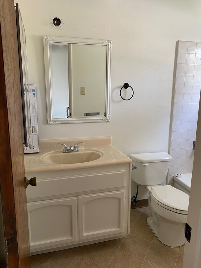 Painted and new vanity light to be installed - 405 N Broadway