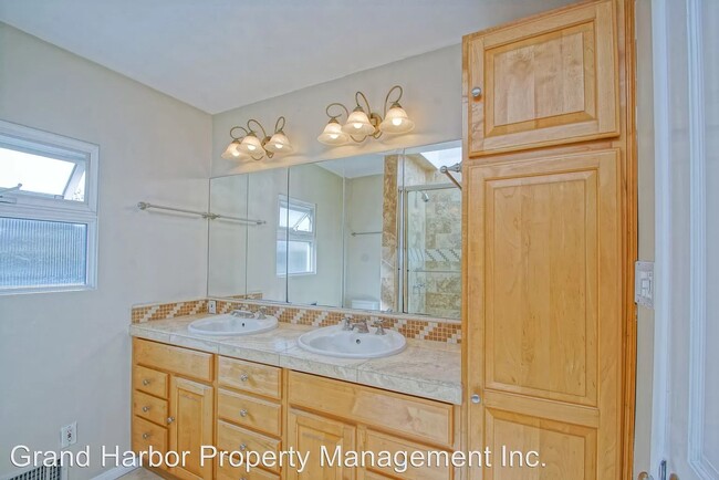 Main Bath Travertine Finish W/Two Sinks & Chests - 2300 Oak Ave