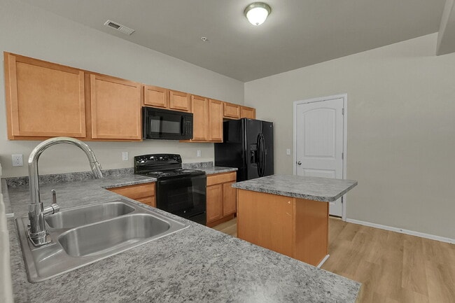 Building Photo - $1,895.95, 3-bed, 2.5-bath townhome located in Colorado Springs.