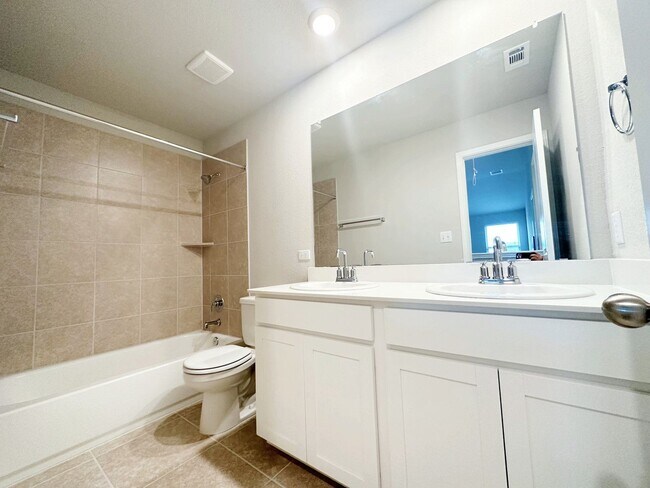 Building Photo - Bright & Roomy 5 Bedroom, 2.5 Bathroom Home with 2-Car Garage