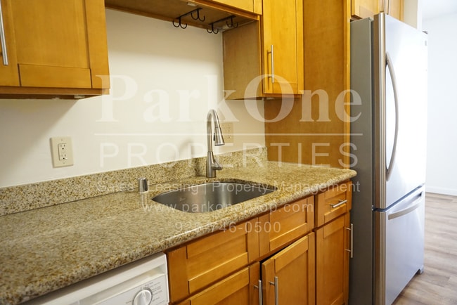 Building Photo - Well-Maintained 2-Bedroom Condo | Garage +...