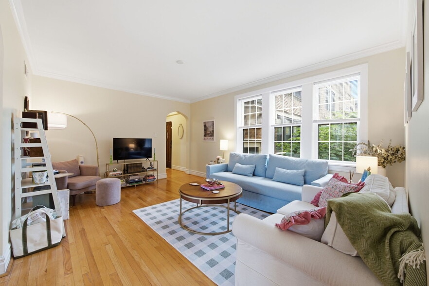 Staged Living Room with Sunlit Windows – 1,220 Sq Ft 2BR, Wydown-Skinker 63105 - Rosebury Rentals