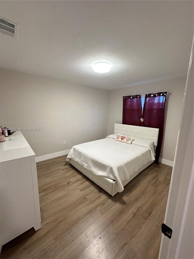 Building Photo - 6729 Petunia Dr