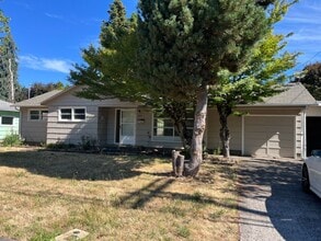Building Photo - New flooring, New Paint. Garage & Carport