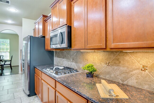 Building Photo - 8470 Coral Cove Pass Ln