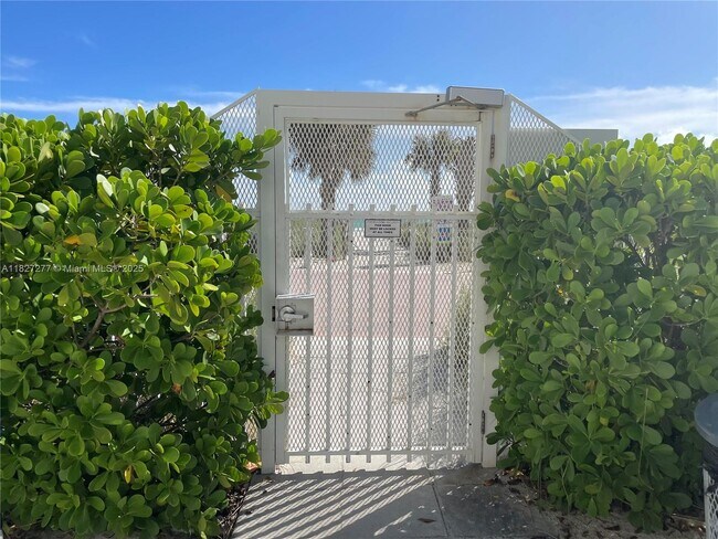Building Photo - 5005 Collins Ave