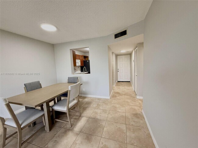 Building Photo - 8550 N Sherman Cir
