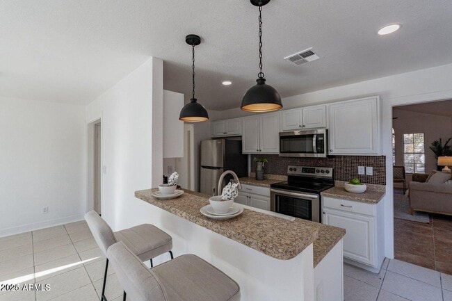 Building Photo - 5248 N 102nd Ave