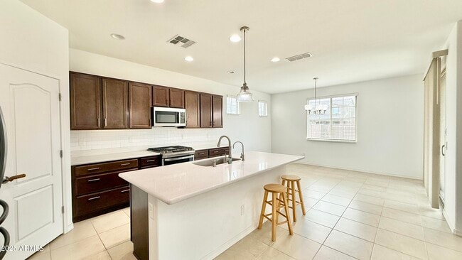 Building Photo - 10935 E Tesla Ave