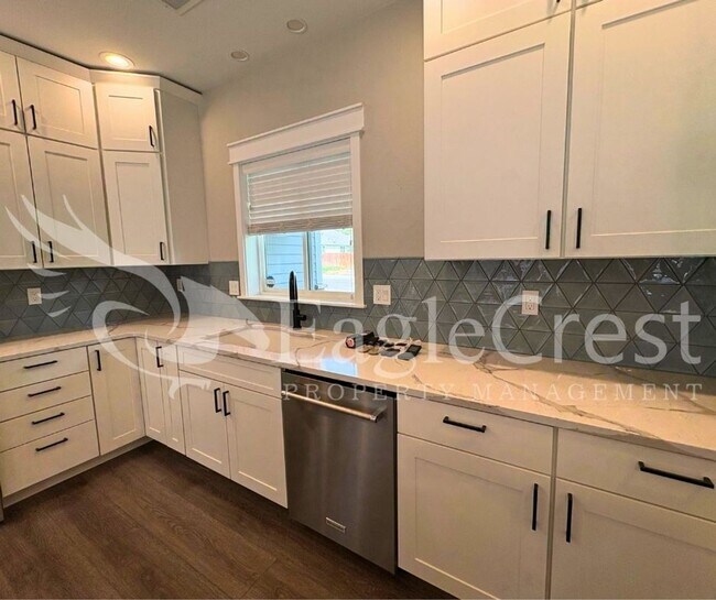 Building Photo - Contemporary Home With A Covered Patio & Quartz Countertops