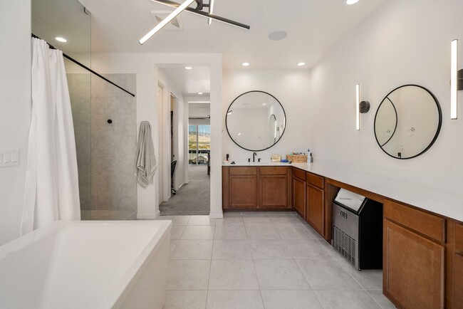 Building Photo - Beautiful 4BR/4BA home in the gated Copper View community. Features spacious living areas, mounta...