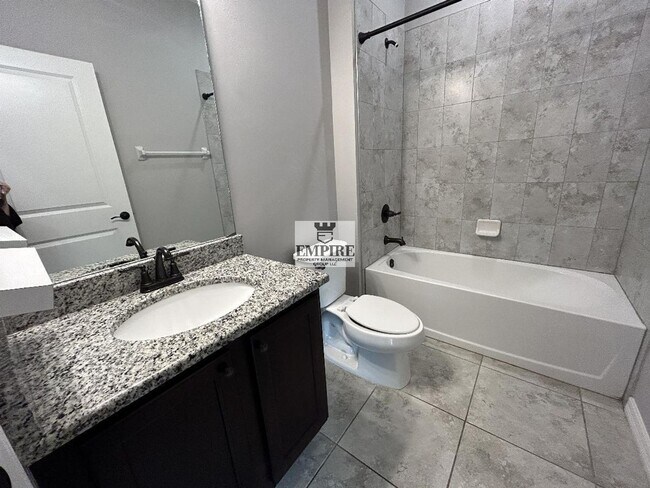 Building Photo - COMING SOON! 3 Beds + Den, 2 Baths, Screened Lanai & More!