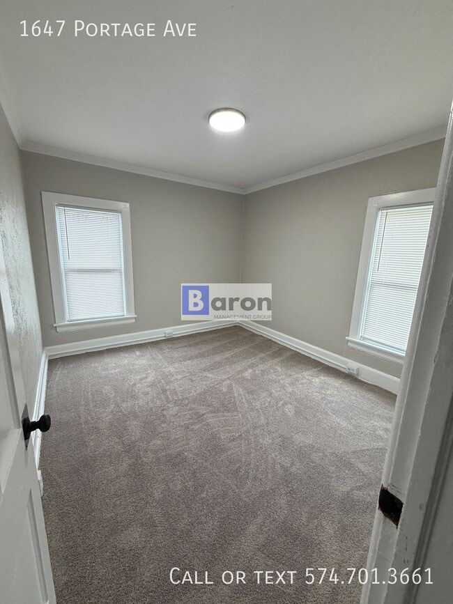 Building Photo - 1647 Portage Ave