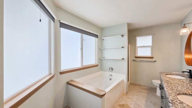 Building Photo - Updated 4-Bed Home Near Future Light Rail ...