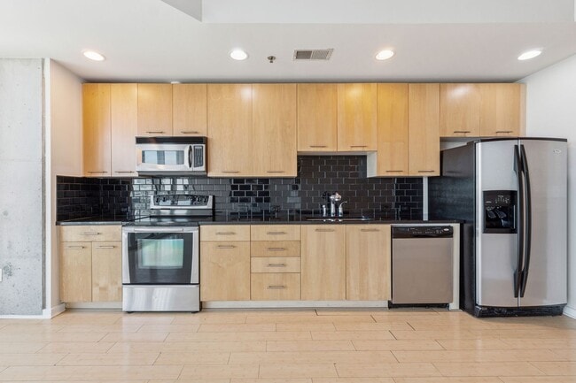 Building Photo - Sought After Realm Residences!
