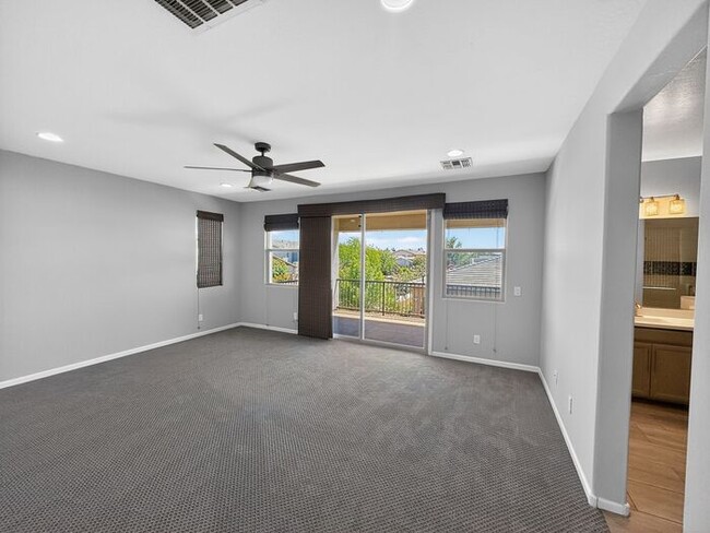 Building Photo - Stunning 5 Bed/5Bath Home in Gated Community – Over 3,100 SqFt of Modern Living -New Carpet throu...