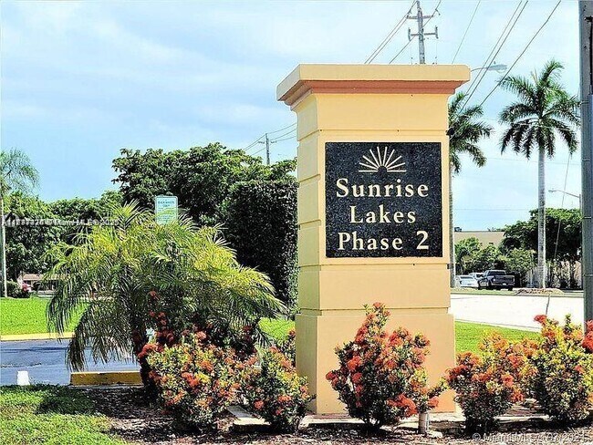 Building Photo - 8285 Sunrise Lakes Blvd