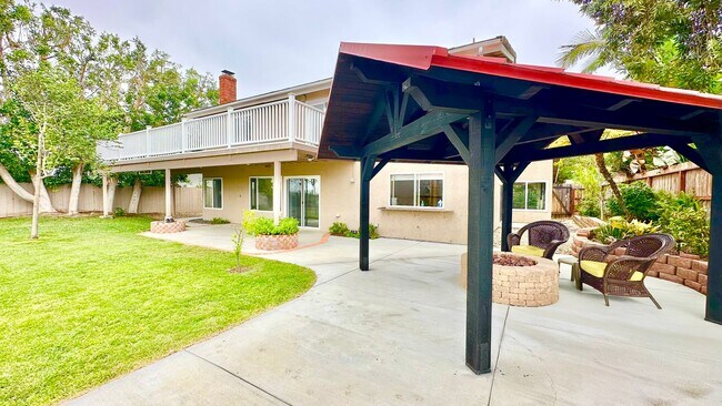 Building Photo - Spacious Two-Story Home with Three-Car Att...