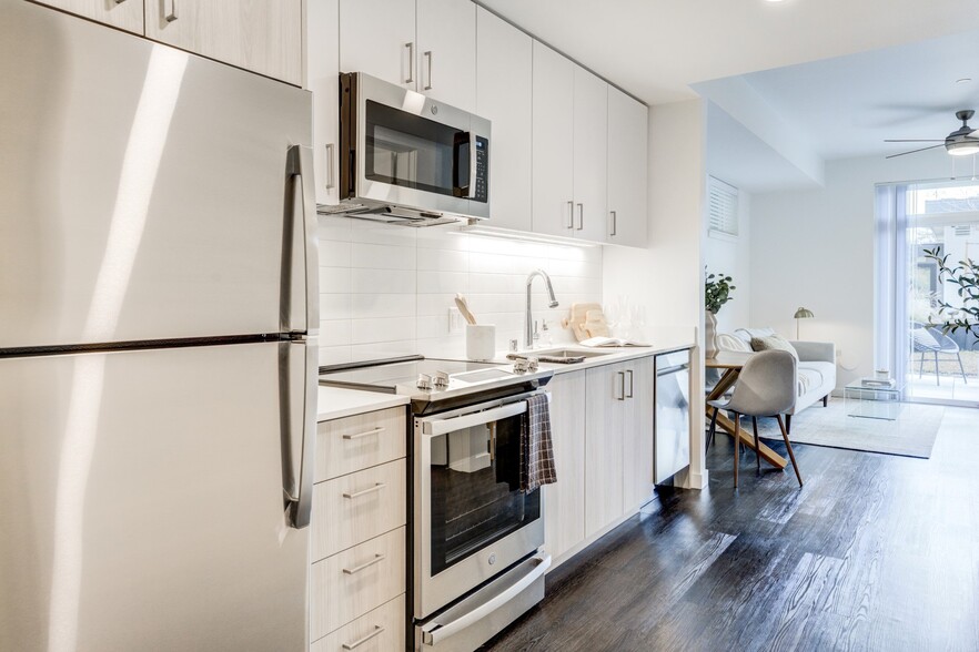 Our chef inspired kitchens feature designer finishes and stainless-steel appliances. - Windsor Totem Lake