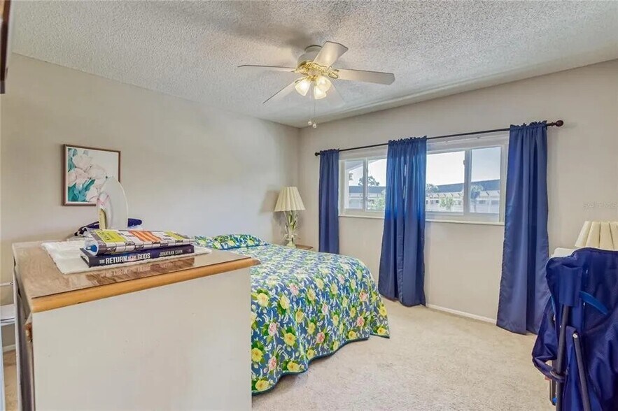 Guest bedroom comes with ceiling fan and closet - 2460 Franciscan Dr