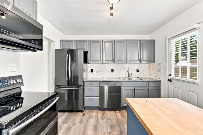 Building Photo - $1,545.95, 2-bed, 1-bath home in Brighton with a large fenced backyard.