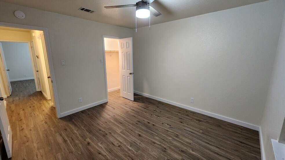 Each bedroom about the same size with lighted closet - 1110 Circle M Dr