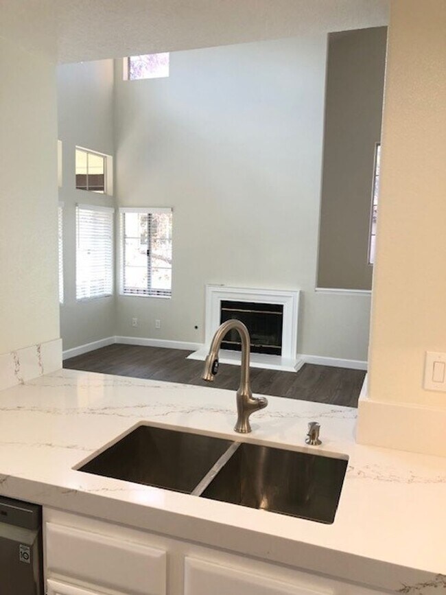 Building Photo - PICTURE PERFECT 2 BR/2 BATH PLUS LOFT END UNIT CONDO WITH DIRECT ACCESS 2 CAR GARAGE