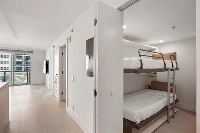 Building Photo - 9499 Collins Ave