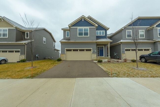 Building Photo - Awesome maple grove 5 bed 4 bath townhome! Pond views, 2 years old!
