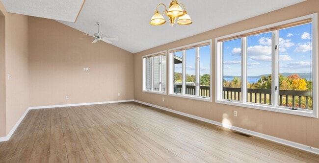 Building Photo - Lakefront End-Unit Condo with Crystal Lake...