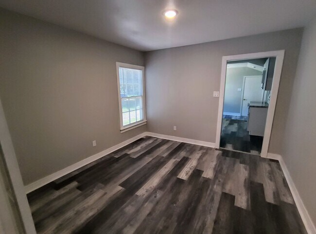 Building Photo - Fully Renovated 3-Bedroom Rental – New Appliances, Huge Yard, Garage, & Individual Room A/C!