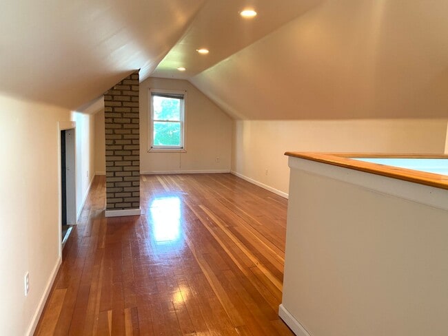Building Photo - Three bedroom home with beautiful hardwood floors and central air!