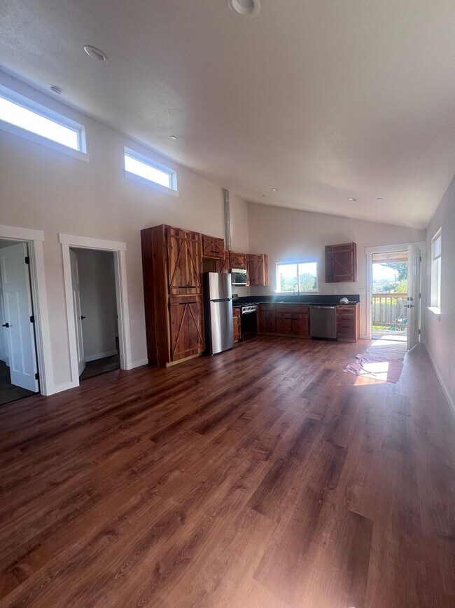 Building Photo - 2 Bedroom 1 bath house with extra large double car garage and extra storage space!