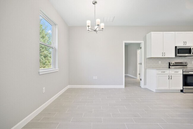 Building Photo - Modern New Home for Rent with Bonus Room in North Port