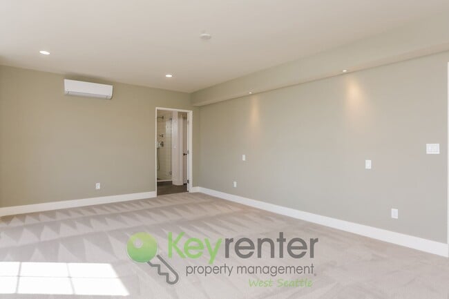 Building Photo - Spacious Living with Balconies, Deck, and Private Yard