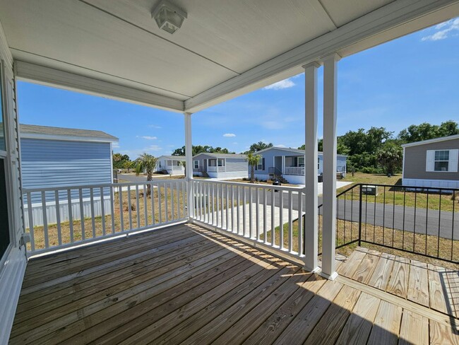 Building Photo - 6681 Hidden Oaks Dr