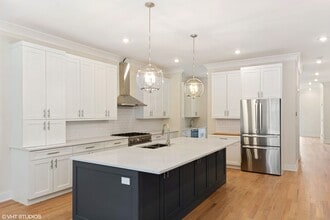 Building Photo - Condo Quality 3,400 SF Duplex Down in Roscoe Village, Pet Friendly Available August 1st