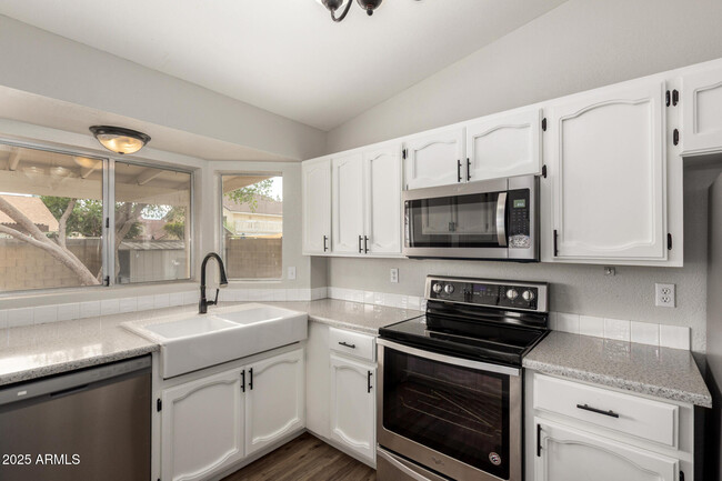 Building Photo - 421 E San Angelo Ave