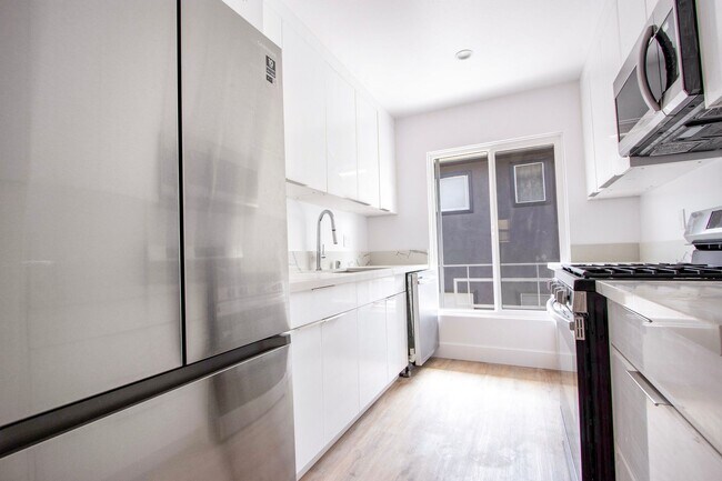 Building Photo - 1040 N Genesee Ave